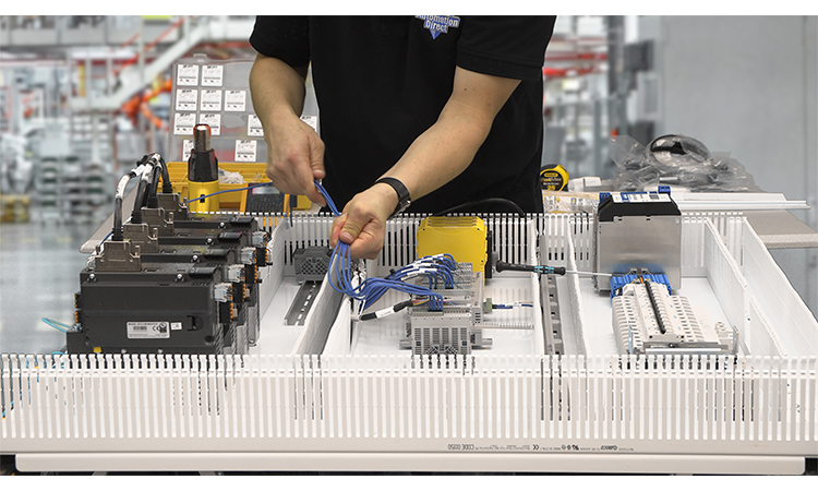Figure 4: In addition to PLCs, HMIs, VFDs, servo drives, and other electrical/instrumentation/controls components, AutomationDirect offers everything a shop needs for assembling and wiring control panels. PBUS-38-Automation-ControlPanelAssembly3-750.jpg